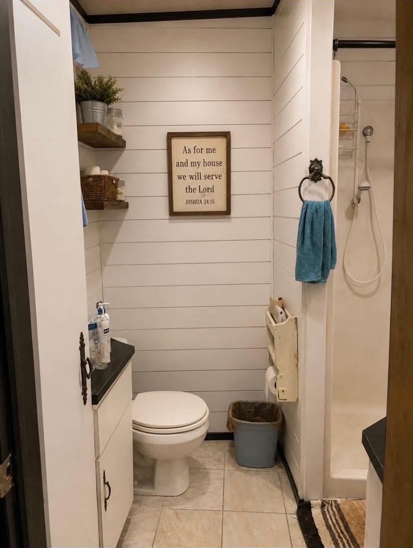 Remodeled bathroom with shiplap walls